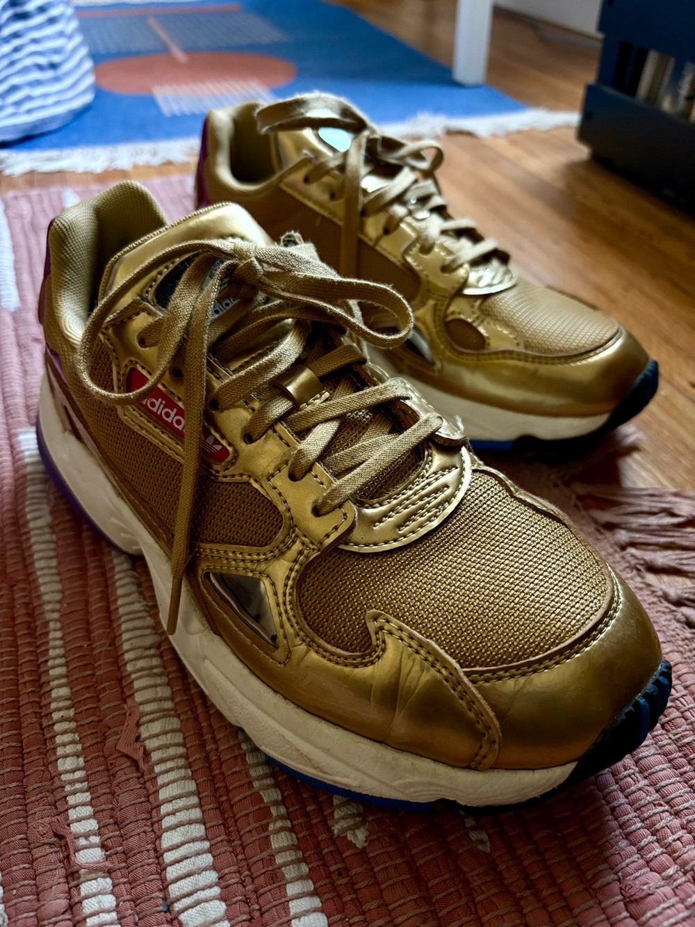 Gold adidas sneakers